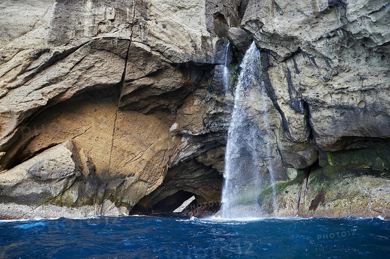 Steep coast with waterfall