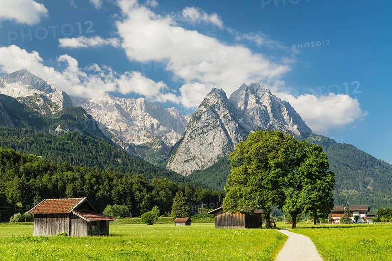 Hay barns at Hammersbach hiking trail towards Wetterstein range