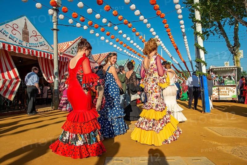 Women in colourful flamenco dresses