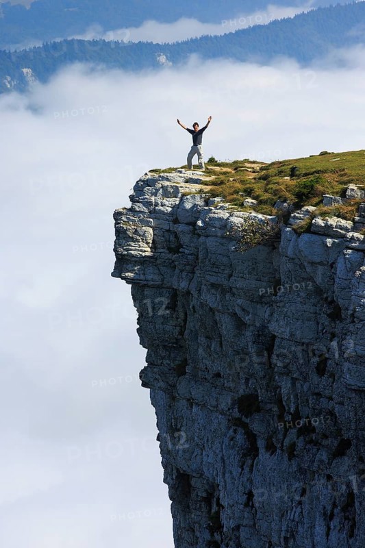 Man standing edge of the Creux du Van