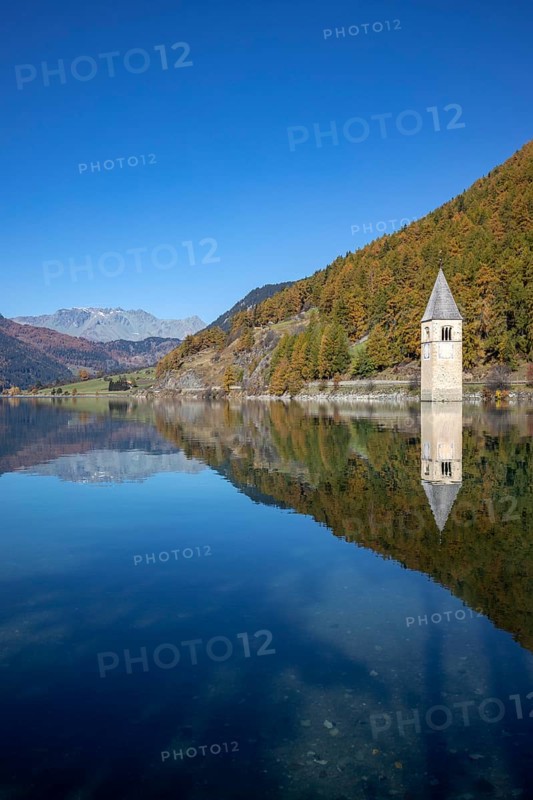 Sunken church tower in the reservoir at the Reschenpass