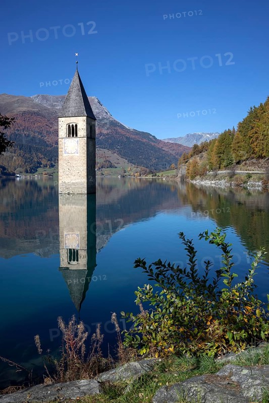 Sunken church tower in the reservoir at the Reschenpass