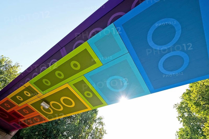 The Lego Bridge 2.0 or Rainbow Bridge is a concrete beam bridge over Dahler Strasse in Wuppertal-Langerfeld. Developed by graffiti and streetart artist Martin Heuwold