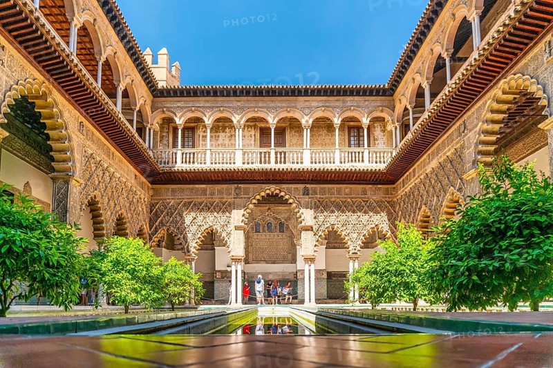 Moorish architecture of beautiful castle called Real Alcazar in Seville