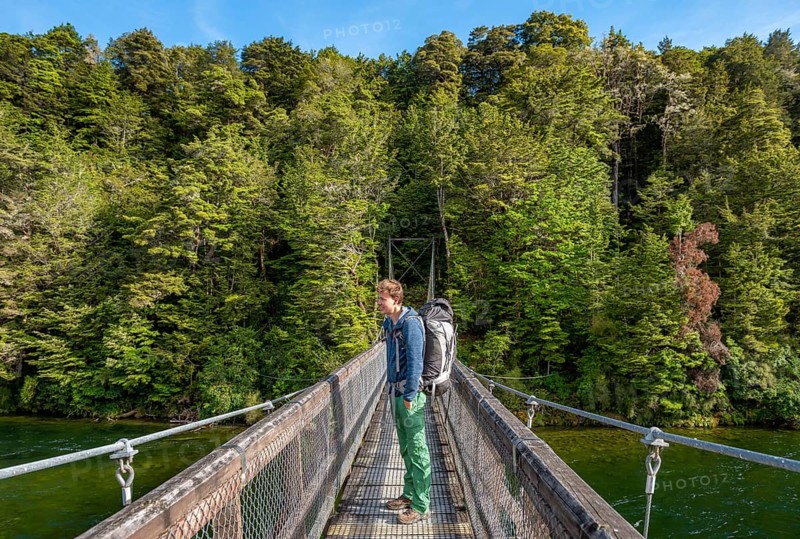 Hiker on suspension bridge