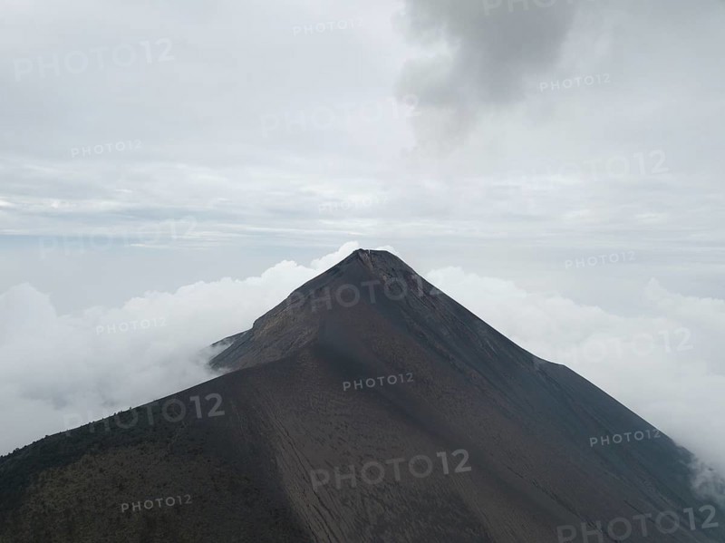 Smoke spitting volcano
