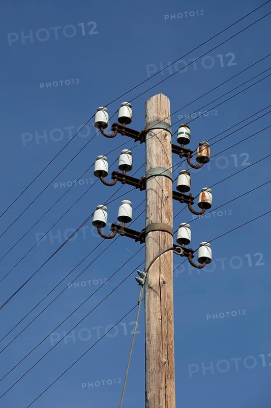Old power pole with ceramic insulators