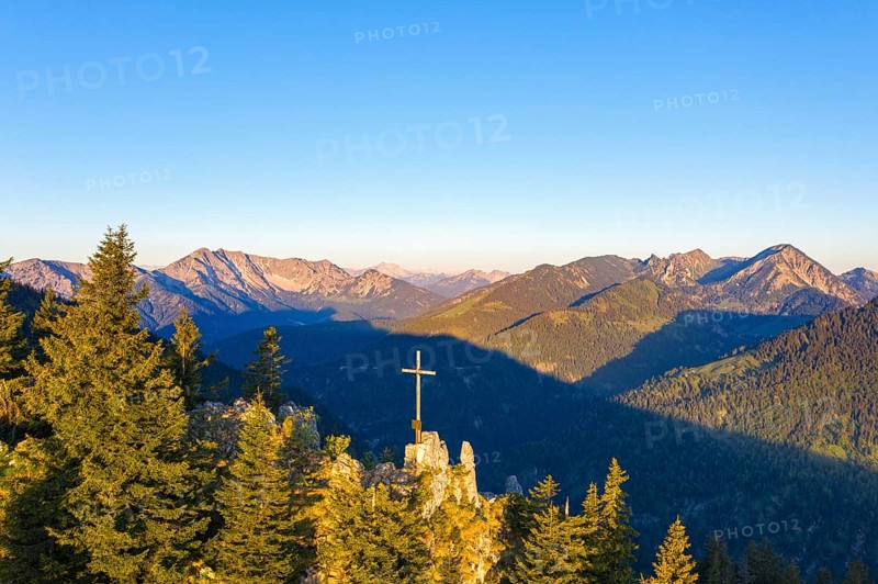 Summit cross on the mountain Vogelsang at Sudelfeld near Bayrischzell