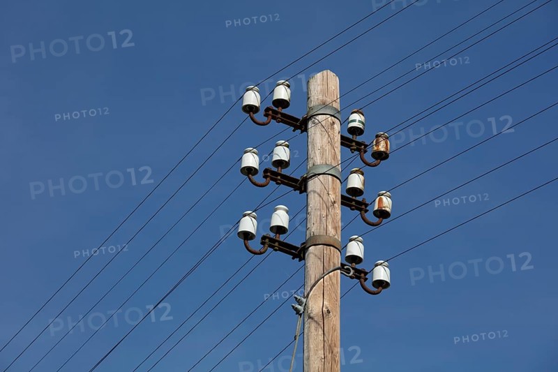 Old power pole with ceramic insulators