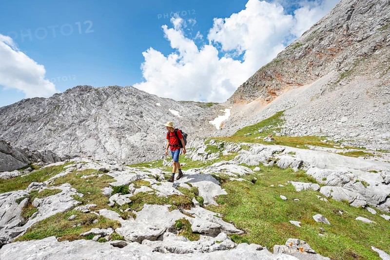 Hiker on hiking trail around the Funtenseetauern