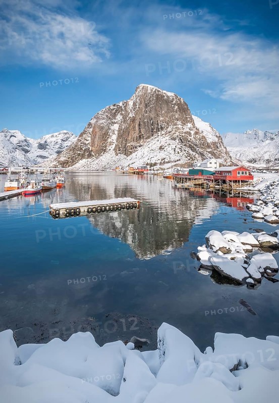 Rorbuer fishermen's cabins on the snowy fjord