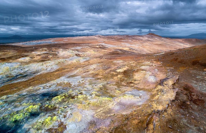 Yellow solfatars in the red rock at Namafjall mountain in the high temperature area Hverir Hveraroend geothermal area in the Myvatn region