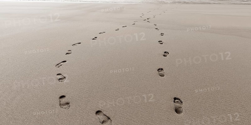 Two footprints in the sand