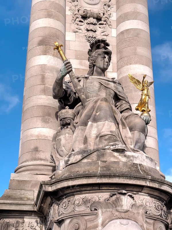 Column with a statue of the bridge Pont Alexandre III