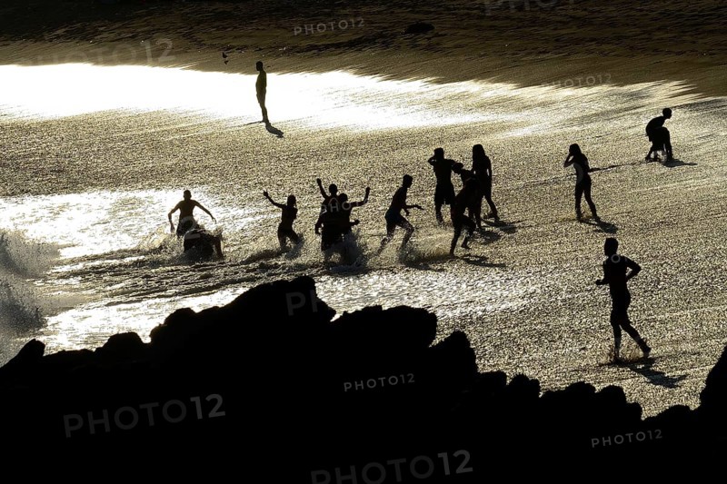 Bathers at the beach of Quebrada de la Huaca