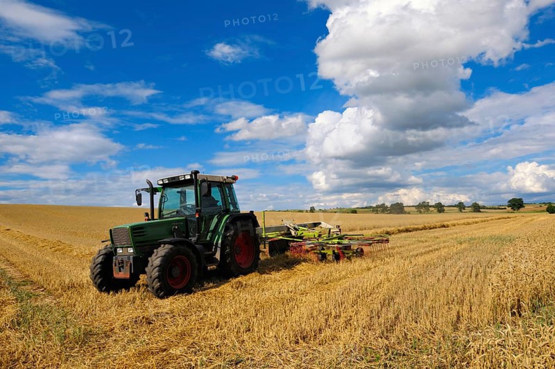 Tractor working in a cereal field
