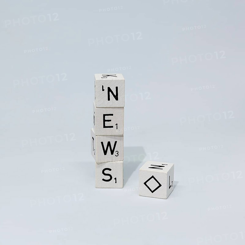 Cubes of letters stacked on top of each other form the word News