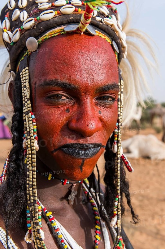 Wodaabe-Bororo man with face painted at the annual Gerewol festival