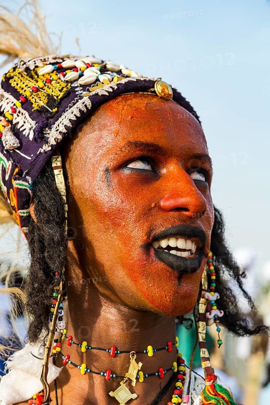 Wodaabe-Bororo man with face painted at the annual Gerewol festival