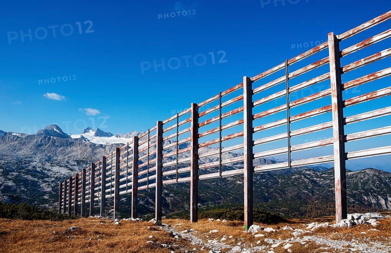 Avalanche barrier with view to the Hoher Dachstein