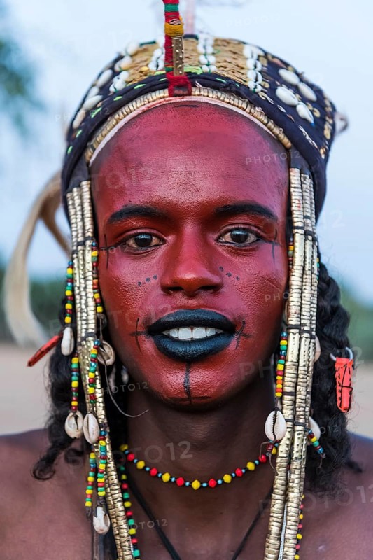 Wodaabe-Bororo man with face painted at the annual Gerewol festival