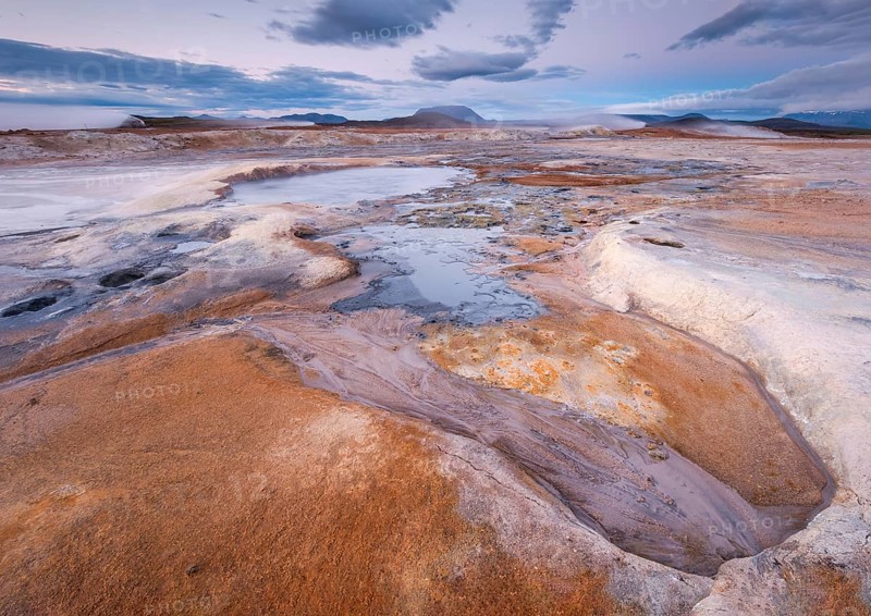 Fumaroles and solfatars in red plain in the high temperature area Hverir Hveraroend geothermal area in the Myvatn region