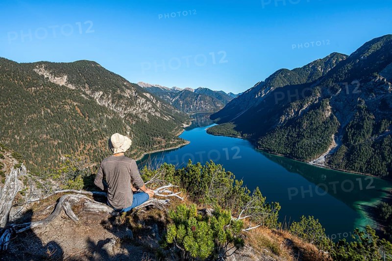 Hiker rests and looks into the distance