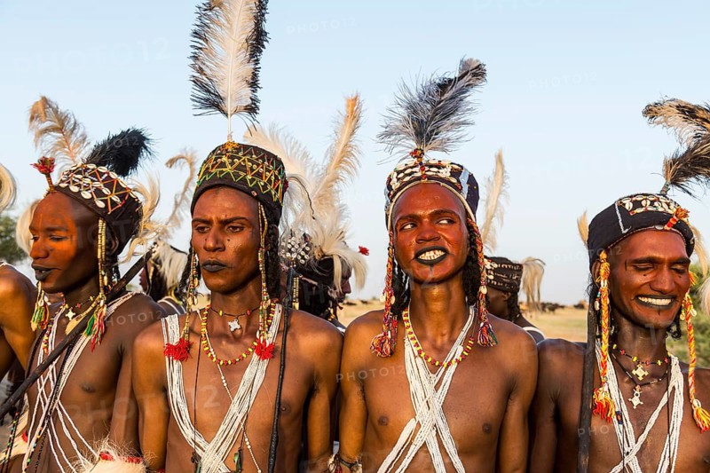 Wodaabe-Bororo men with faces painted at the annual Gerewol festival