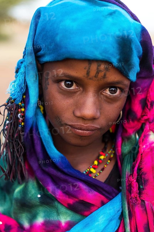 Colourful dressed girl at the Gerewol festival