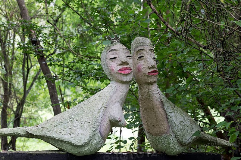 Bizarre pair of birds with human heads