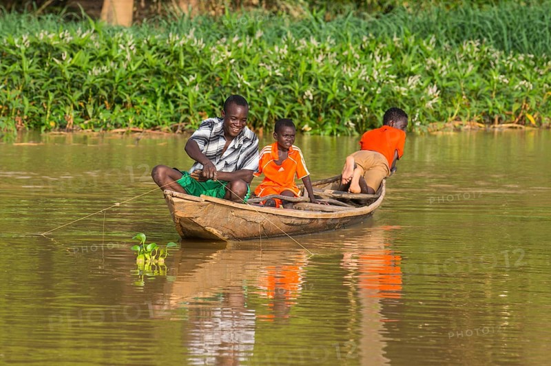 Fishermen in their canoe
