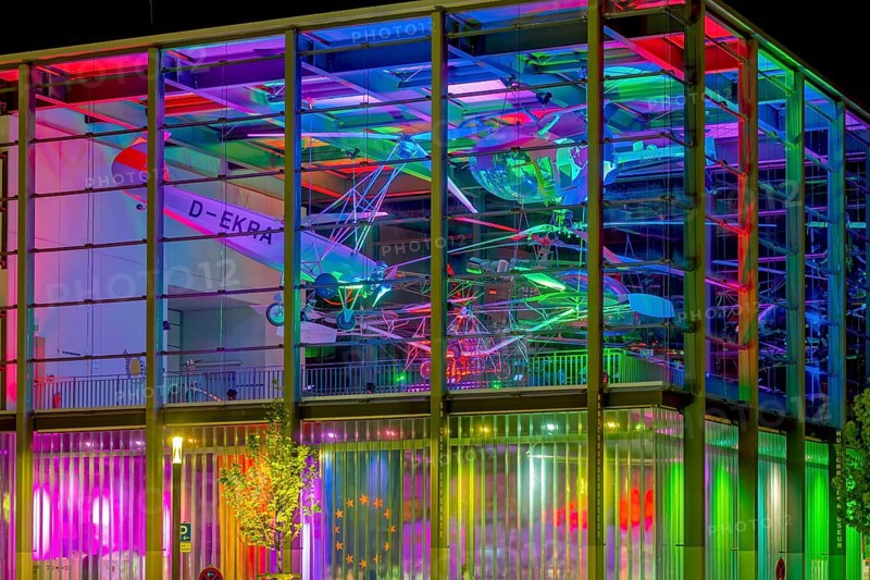 Helicopter museum colourfully illuminated