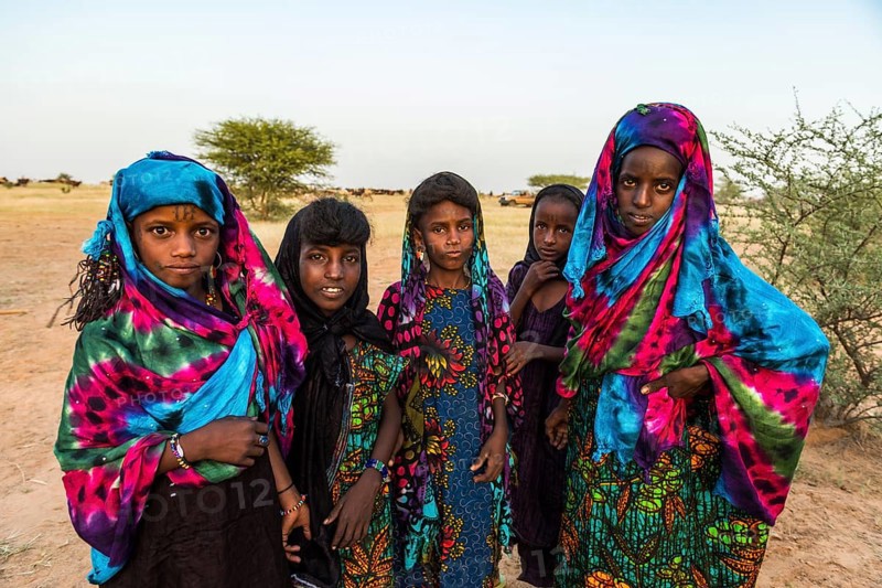 Colourful dressed girls at the Gerewol festival
