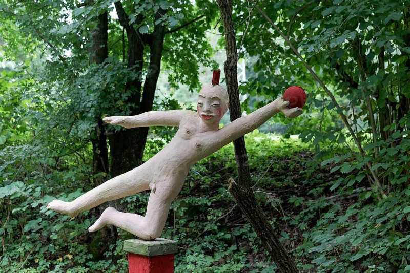 Naked gymnast with ball