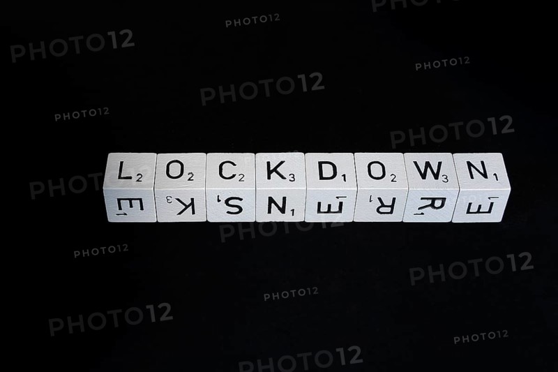 Letter cubes in a row form the word Lockdown