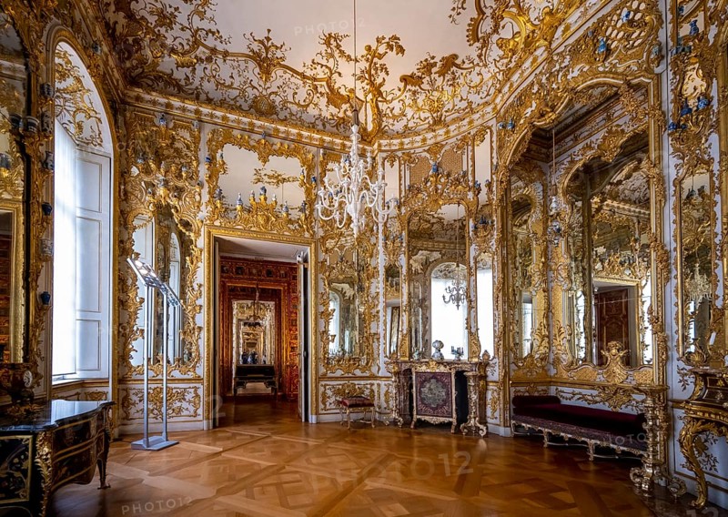 Artfully decorated mirror cabinet