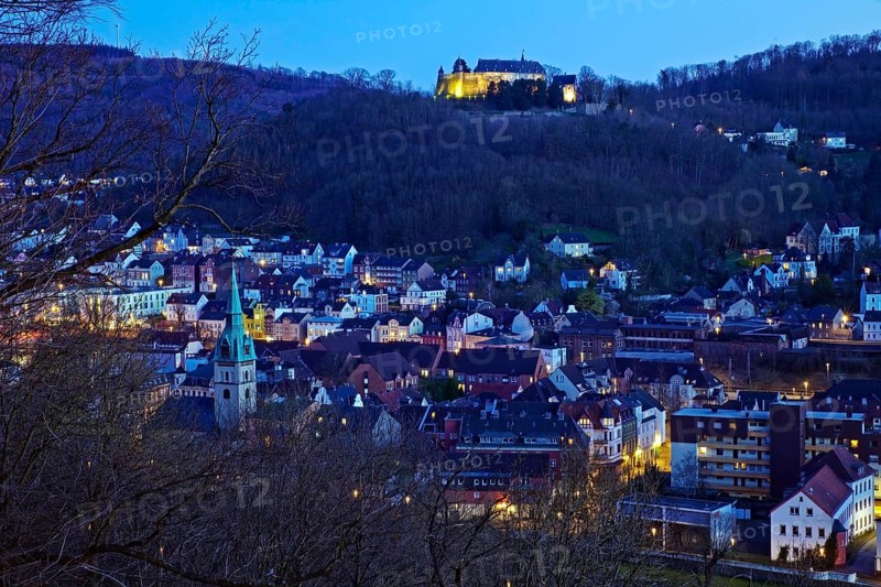 Hohenlimburg with the illuminated castle in the evening