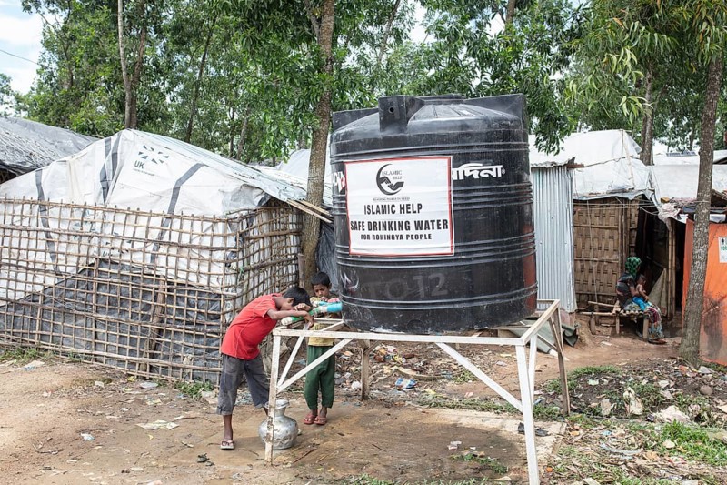 Children fetch water from a tank