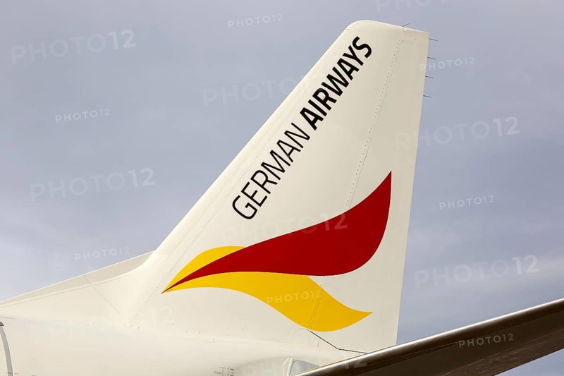 Tail unit of a German Airways Embraer 190 with registration mark D-AJHW at Cologne Bonn Airport