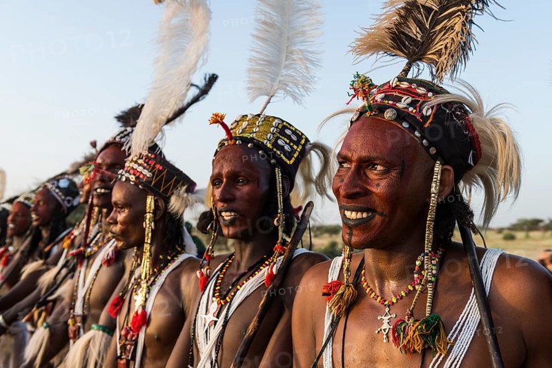 Wodaabe-Bororo men with faces painted at the annual Gerewol festival