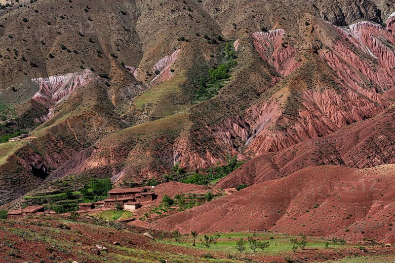 Erosion landscape with small clay village of the Berbers