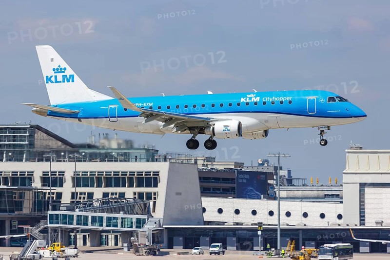 An Embraer ERJ175 of KLM cityhopper with the registration PH-EXM at Stuttgart Airport