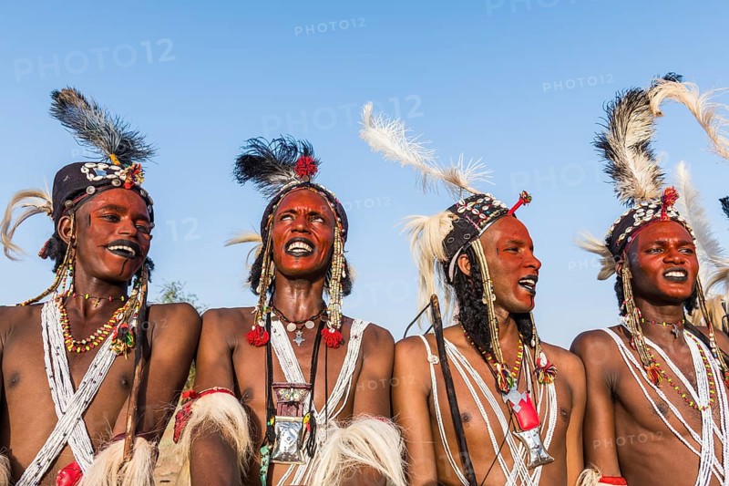 Wodaabe-Bororo men with faces painted at the annual Gerewol festival