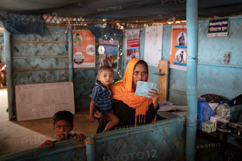 A mother with her children in a medical station in the camp for Rohingya refugees from Myanmar