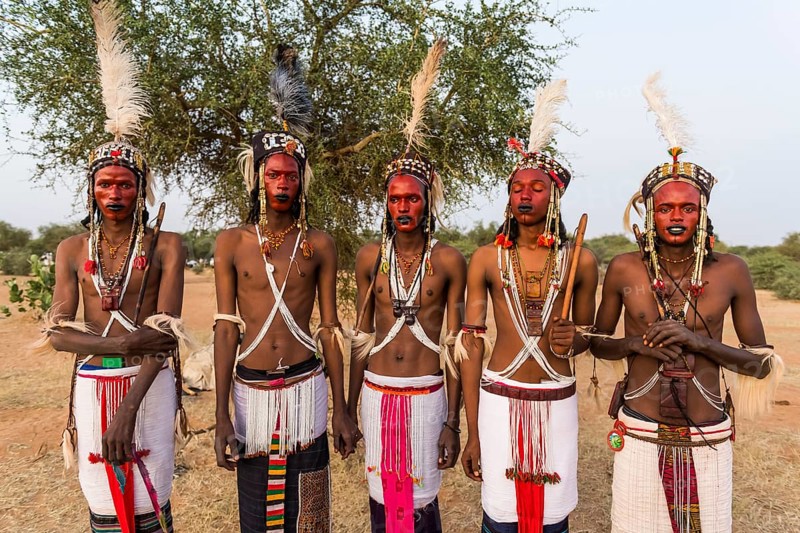 Wodaabe-Bororo men with faces painted at the annual Gerewol festival