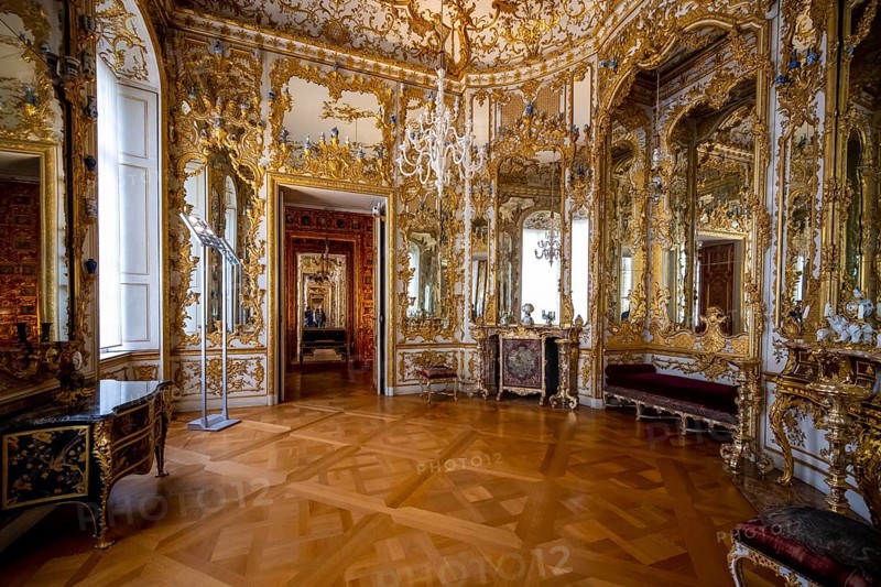 Artfully decorated mirror cabinet