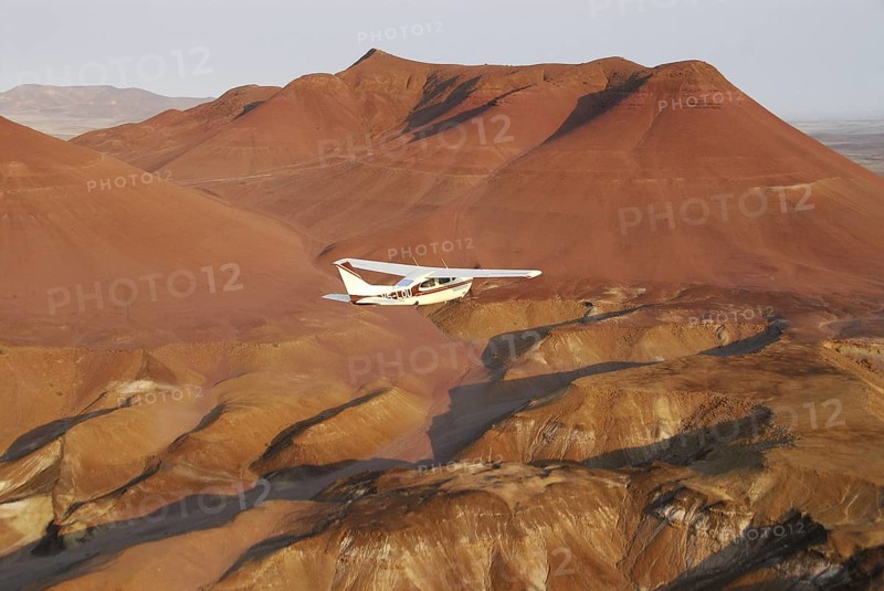 Little airplane over Skeleton coast, Kuidas, Namibia