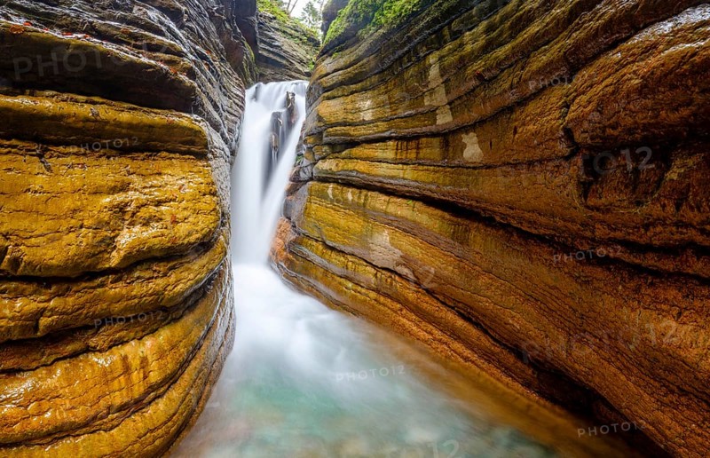 The Taugl or Tauglbach flows through the red gorge