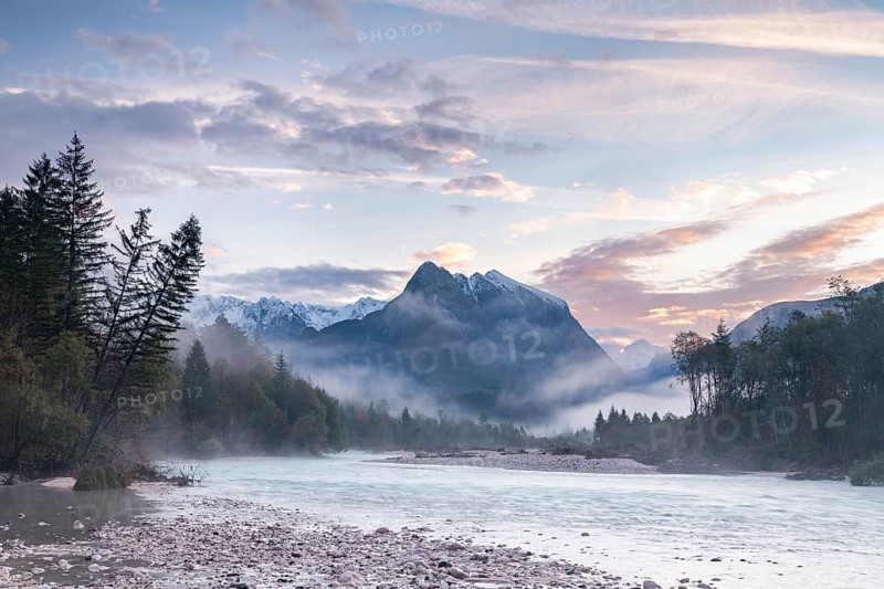 River Soca with Svinjak Mountain in the morning