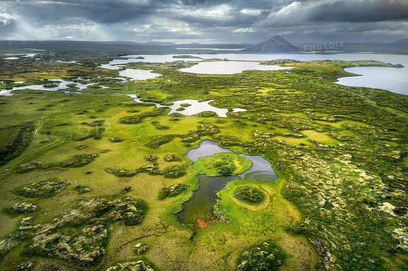Finely structured landscape with green vegetation and small lakes and islands